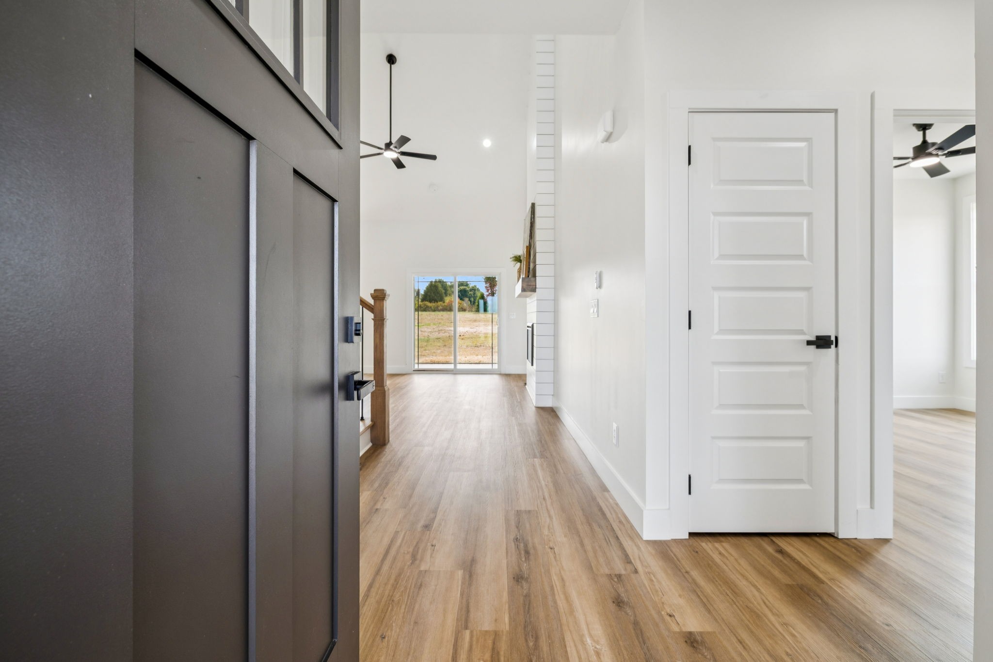 6437 Hopewell Road Springfield, TN 37172 - Photo 6 of 87 a view of a hallway view with wooden floor and staircase