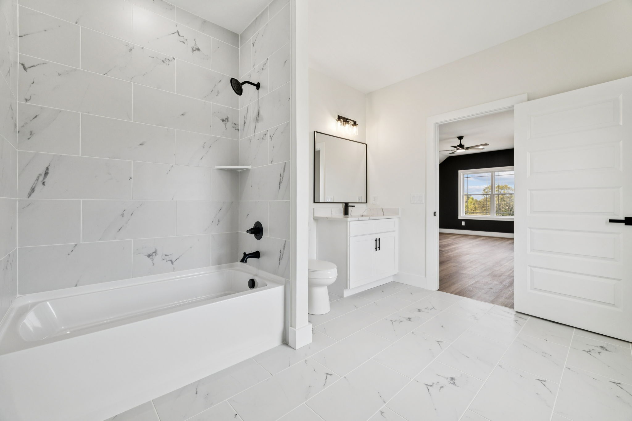 6437 Hopewell Road Springfield, TN 37172 - Photo 73 of 87 a bathroom with a bathtub and a shower