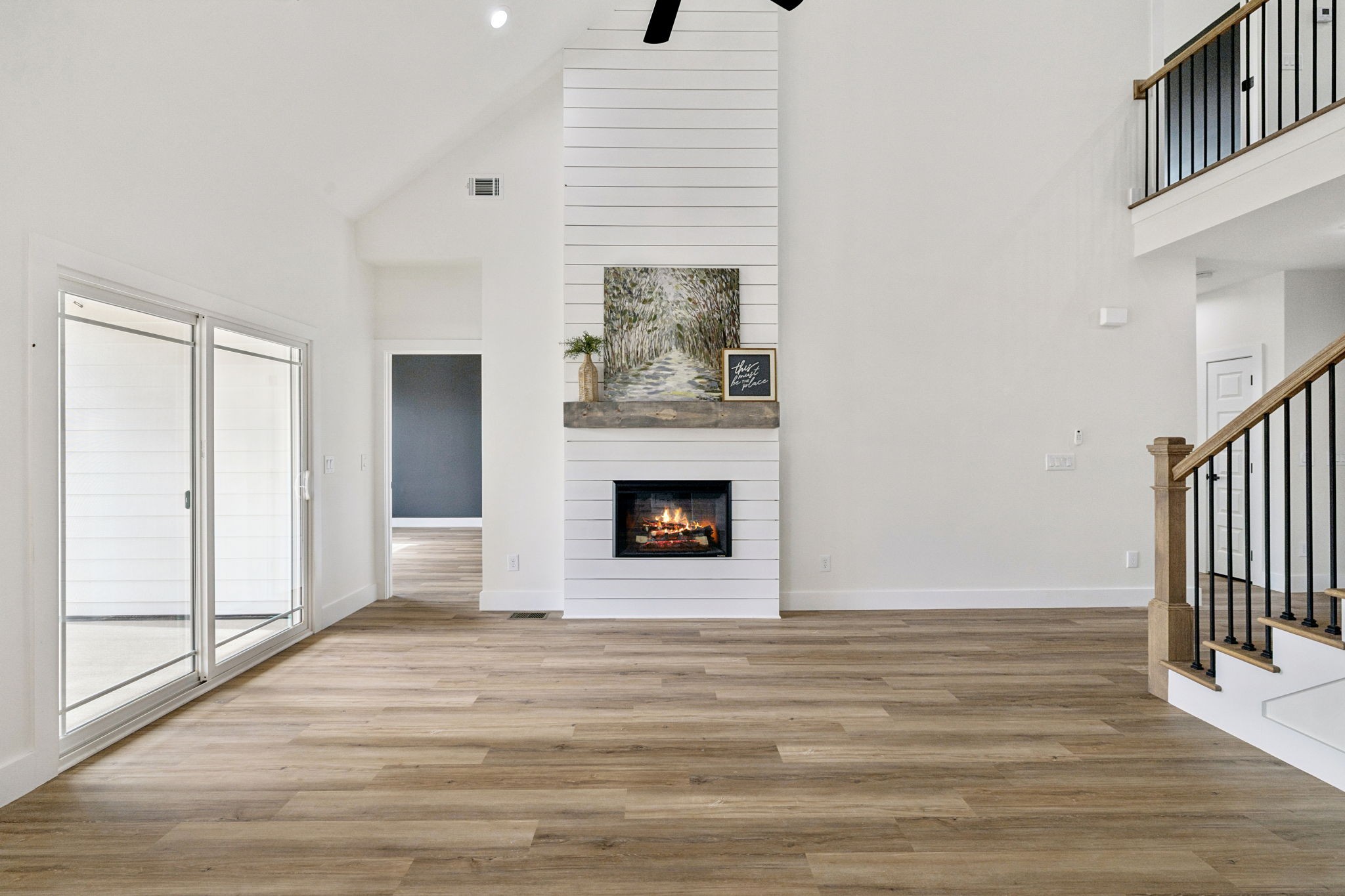 6437 Hopewell Road Springfield, TN 37172 - Photo 10 of 87 a view of a livingroom with wooden floor and a fireplace