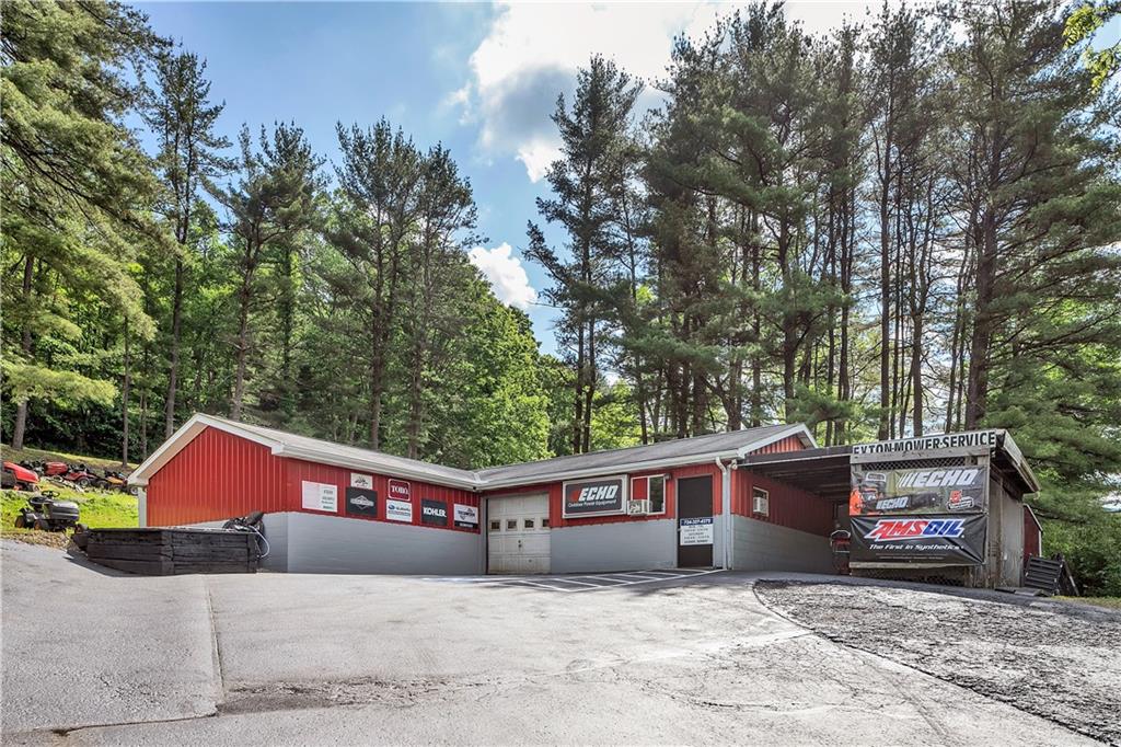 474 Exton Lake Road Apollo, PA 15613 - Photo 31 of 39 a car parked in front of a house