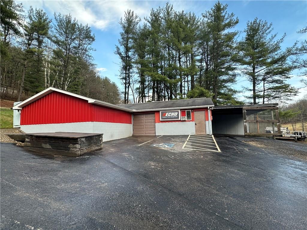 474 Exton Lake Road Apollo, PA 15613 - Photo 35 of 46 a view of a house with a yard and garage