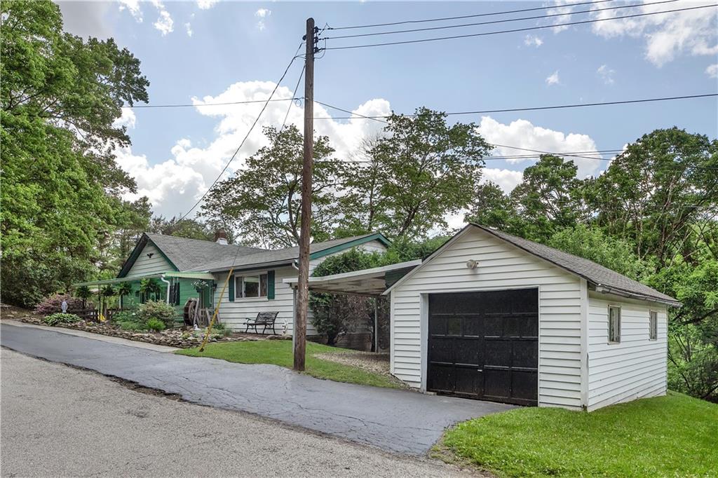 474 Exton Lake Road Apollo, PA 15613 - Photo 5 of 39 a front view of a house with a yard