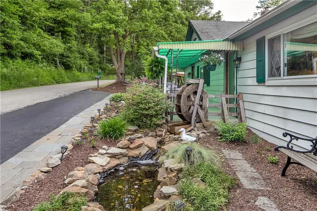 a view of a backyard with patio