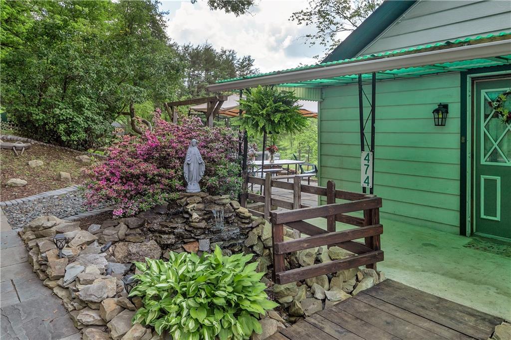 474 Exton Lake Road Apollo, PA 15613 - Photo 8 of 39 a view of a backyard with sitting area