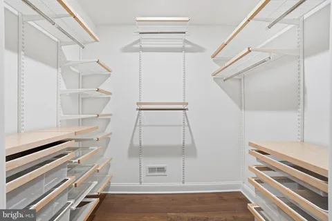 a view of an empty walk in closet