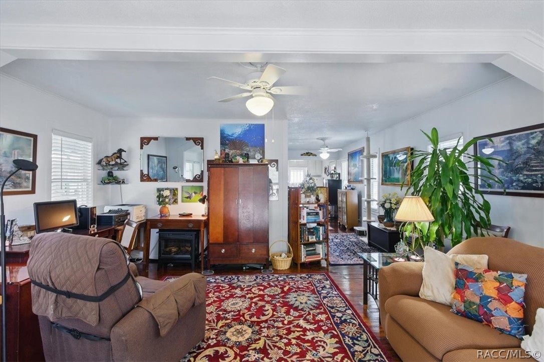 6 62nd Street Yankeetown, FL 34498 - Photo 22 of 55 a living room with furniture chandelier and a chandelier