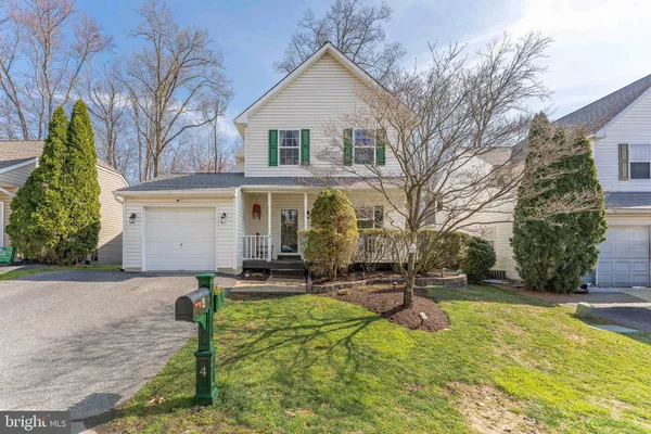 a view of a house with a patio