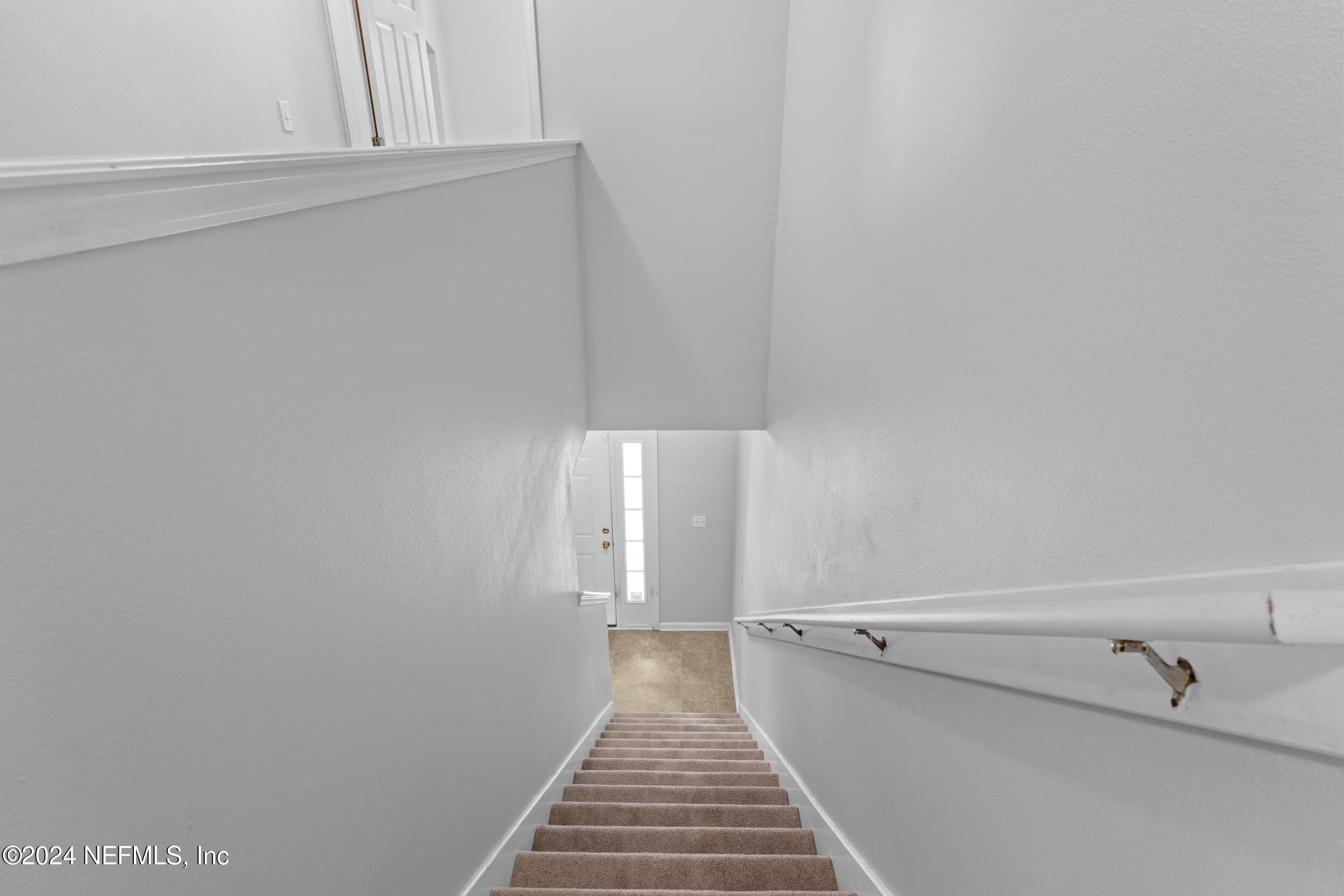 5260 Collins Road, Unit 1101 Jacksonville, FL 32244 - Photo 14 of 25 a view of a hallway with closet