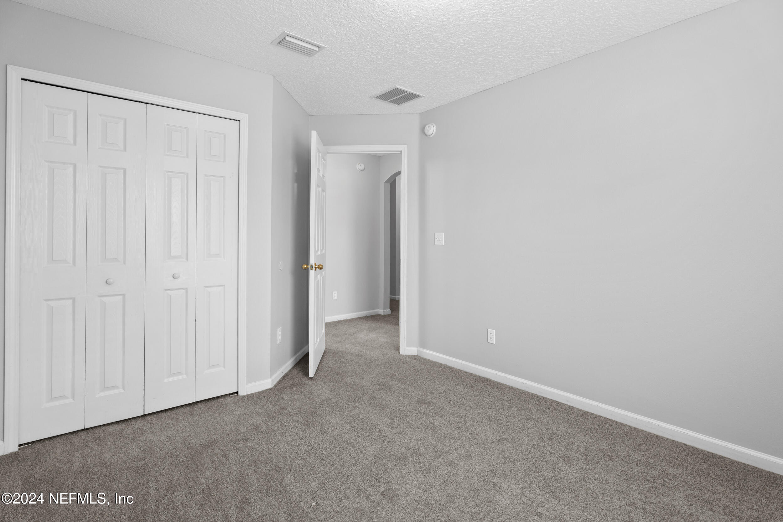 5260 Collins Road, Unit 1101 Jacksonville, FL 32244 - Photo 5 of 25 a view of an empty room