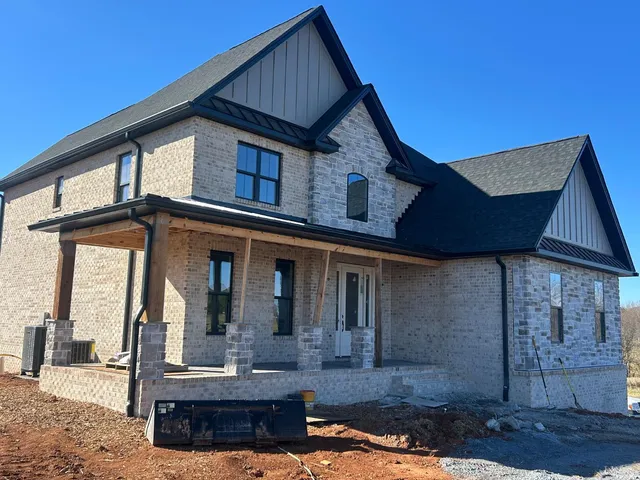 a front view of a house with entertaining space