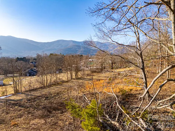 a view of residential house with mountain view