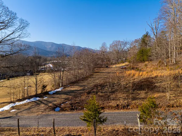 a view of mountain view with lots of trees