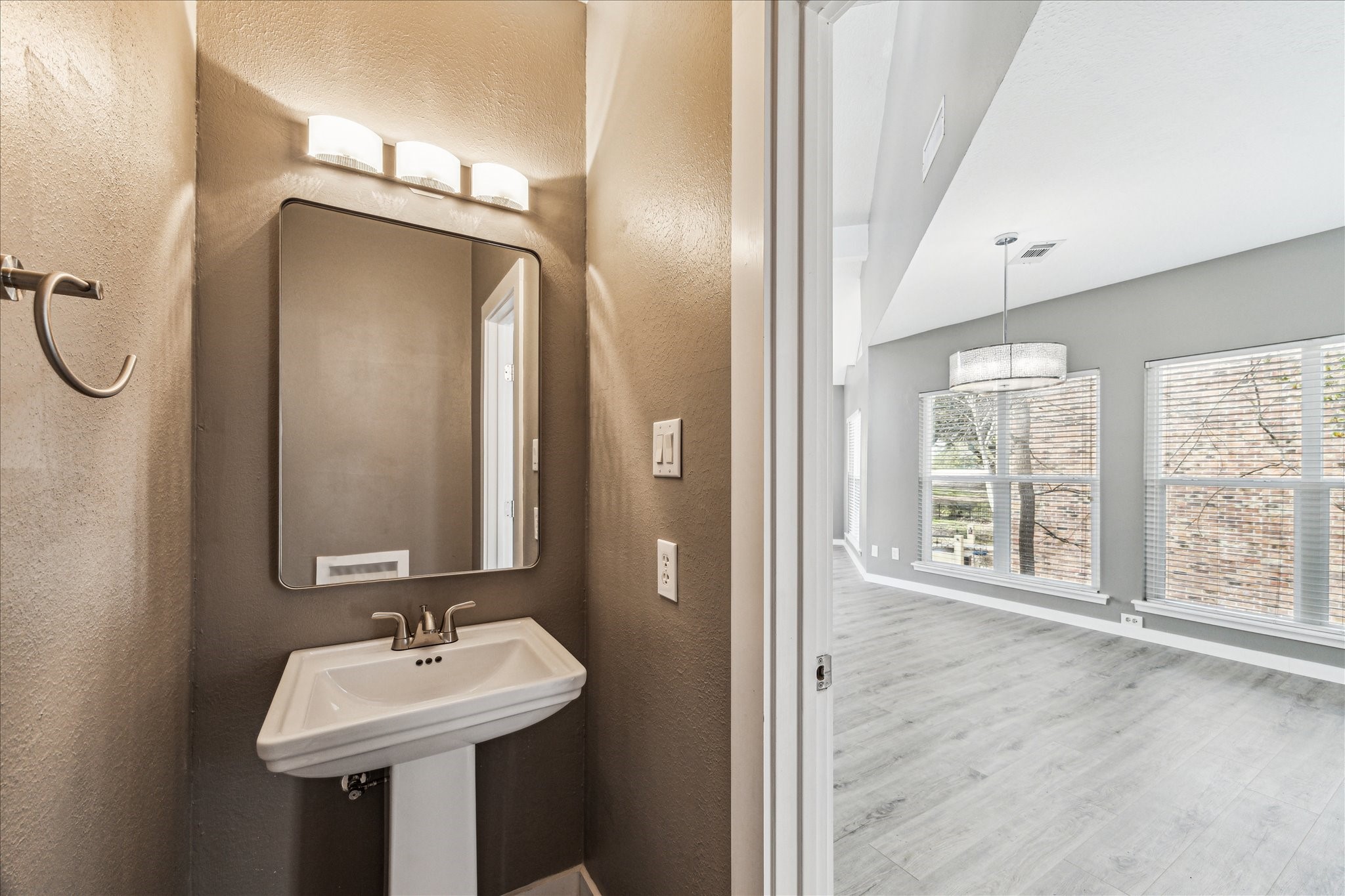 146 Dawns Edge Conroe, TX 77356 - Photo 19 of 39 a bathroom with a sink a mirror and a shower