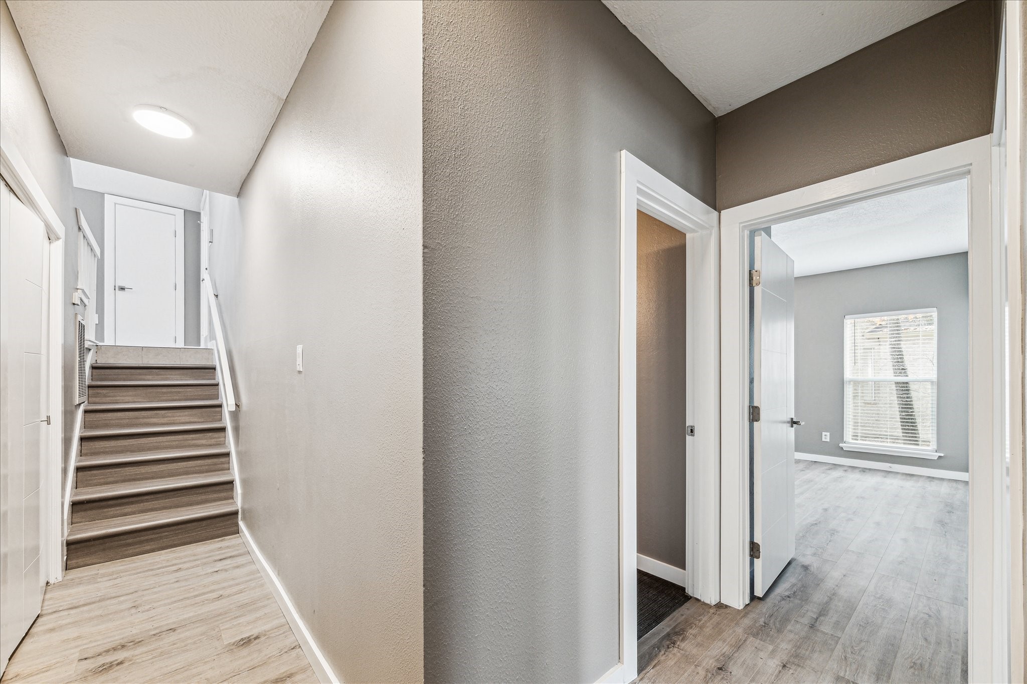 146 Dawns Edge Conroe, TX 77356 - Photo 27 of 39 a view of a hallway with wooden floor and entryway