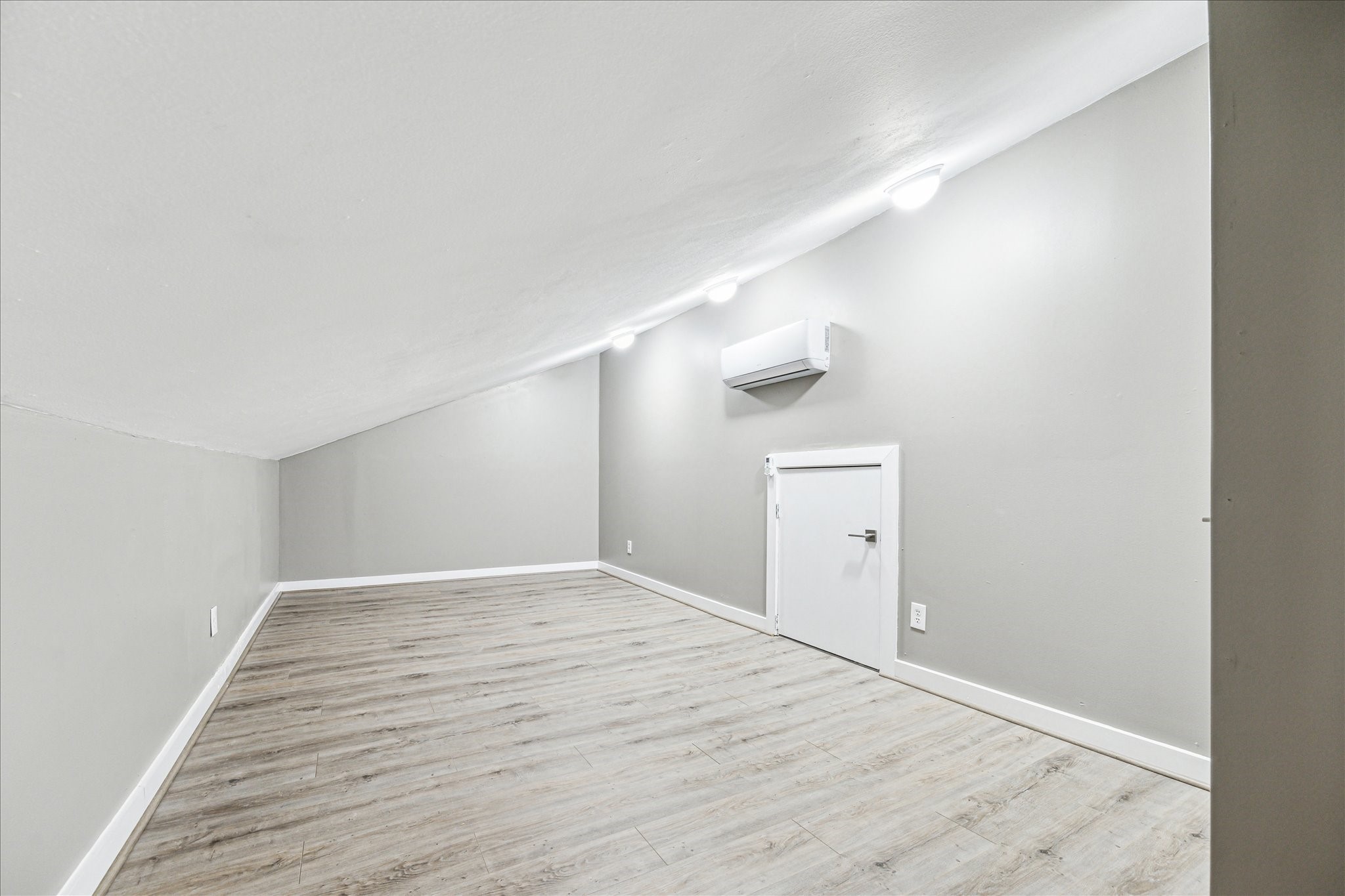 146 Dawns Edge Conroe, TX 77356 - Photo 30 of 39 wooden floor in an empty room