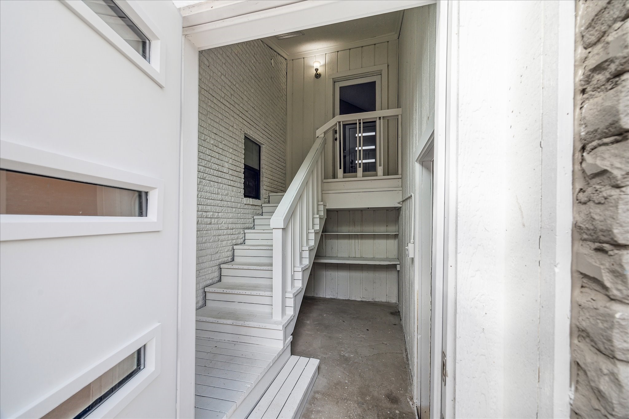 146 Dawns Edge Conroe, TX 77356 - Photo 32 of 39 a view of entryway and hall with wooden floor