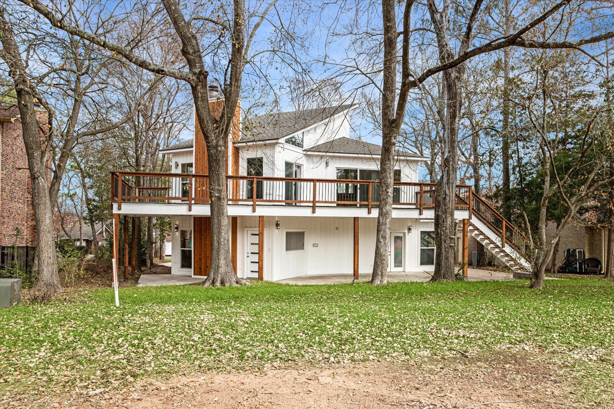 146 Dawns Edge Conroe, TX 77356 - Photo 38 of 39 front view of house with a yard