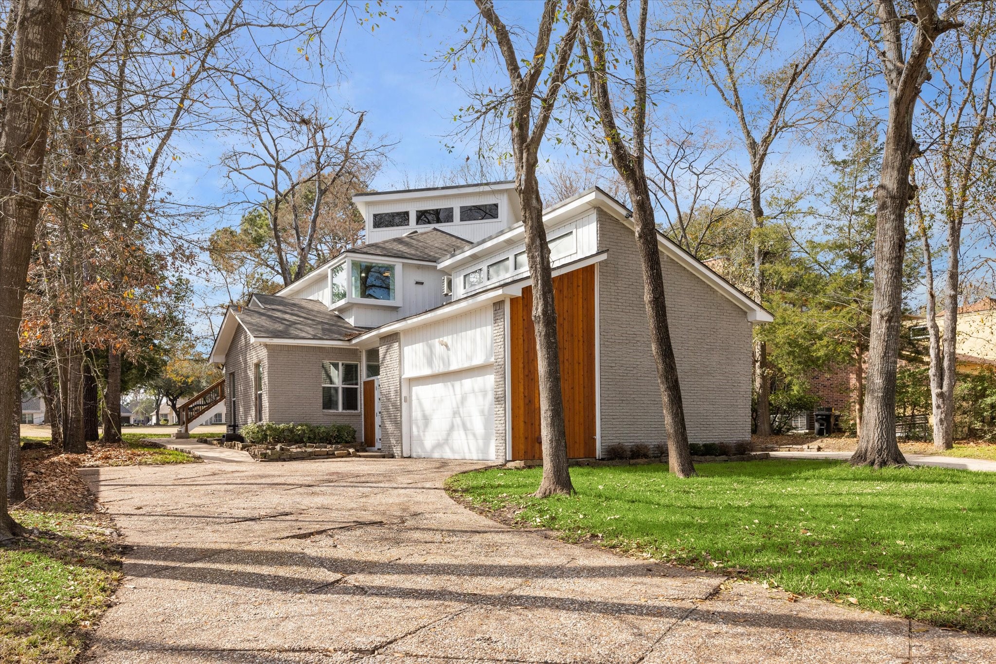 146 Dawns Edge Conroe, TX 77356 - Photo 4 of 39 a view of a house with a yard and pathway