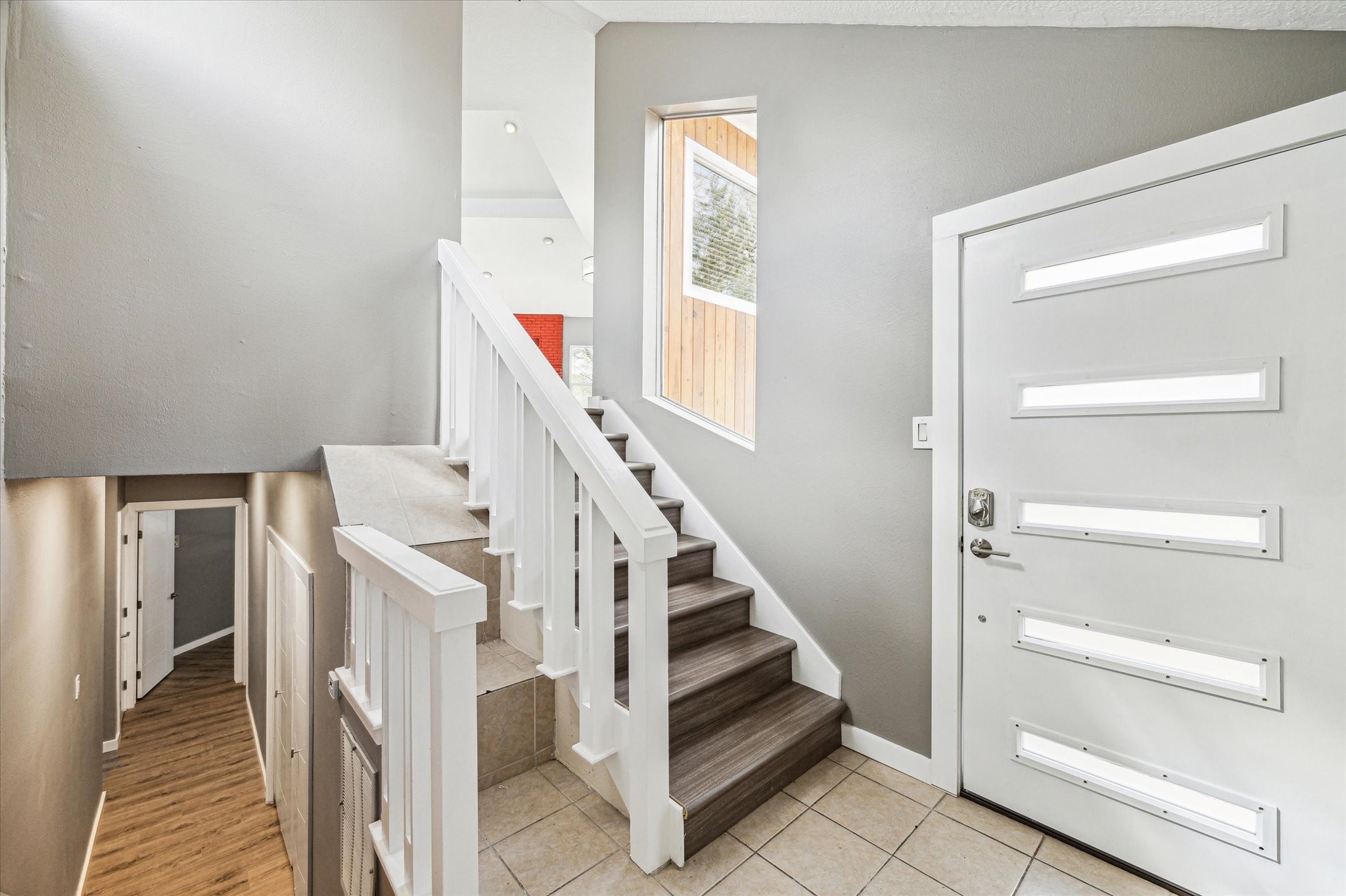 146 Dawns Edge Conroe, TX 77356 - Photo 7 of 39 a view of entryway and hall with wooden floor
