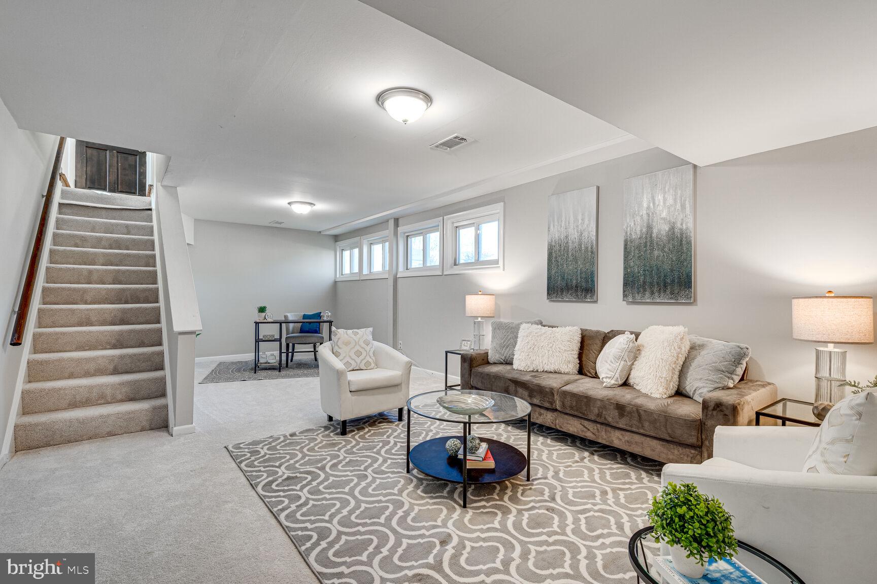 4310 Robert Court Silver Spring, MD 20906 - Photo 13 of 18 a living room with furniture and wooden floor