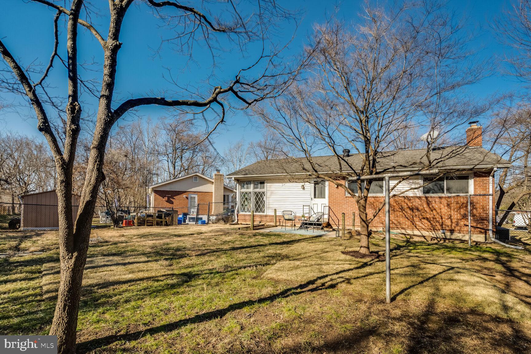 4310 Robert Court Silver Spring, MD 20906 - Photo 17 of 18 a view of a chairs with wooden fence