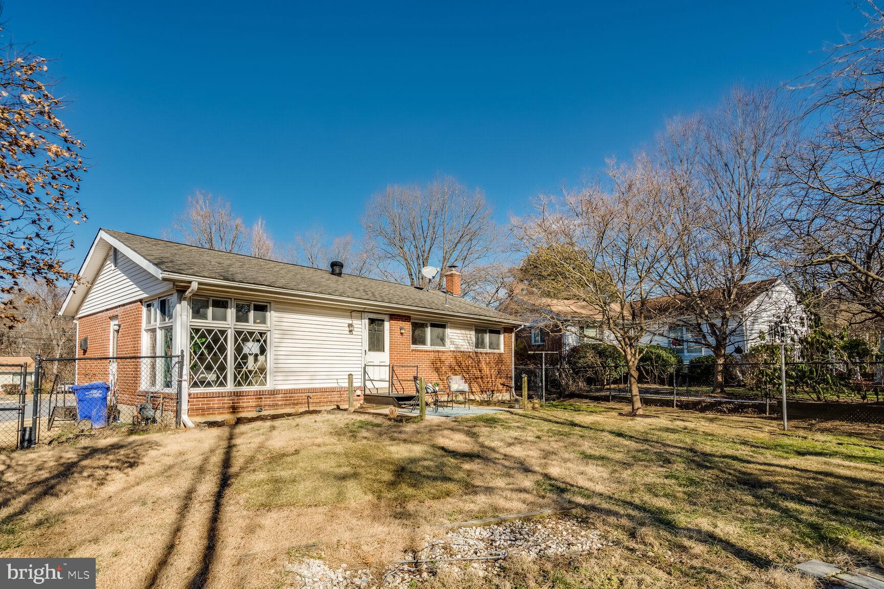 4310 Robert Court Silver Spring, MD 20906 - Photo 18 of 18 a front view of a house with a yard