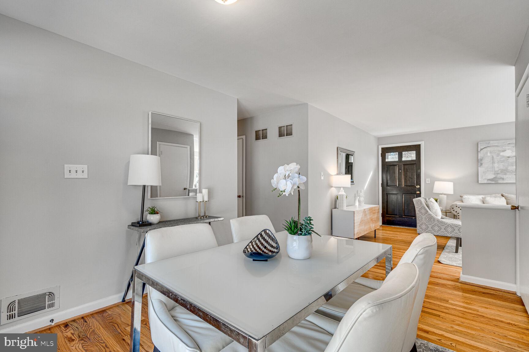 4310 Robert Court Silver Spring, MD 20906 - Photo 5 of 18 a view of a dining room with furniture and wooden floor