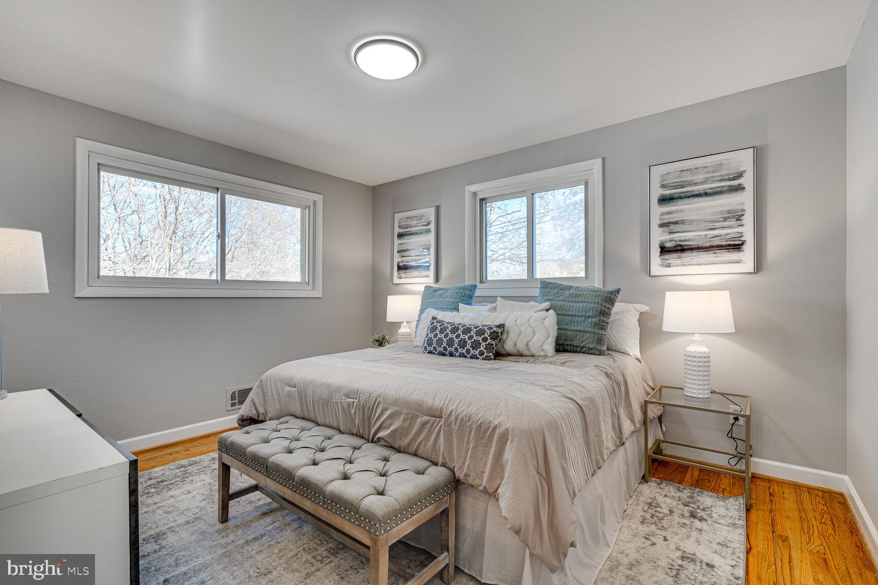 4310 Robert Court Silver Spring, MD 20906 - Photo 7 of 18 a bedroom with a bed and a window