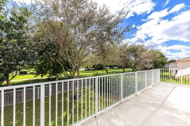 a view of a wooden fence