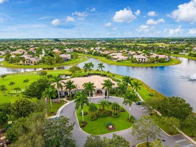 a living room with furniture fireplace and flat screen tv