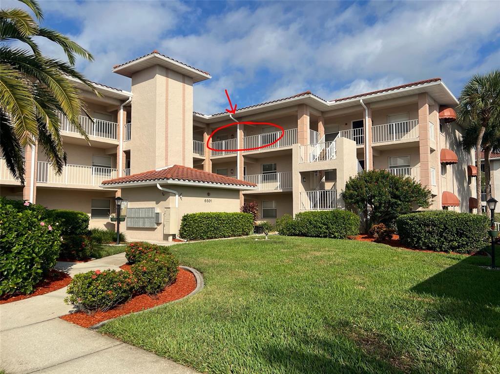 6501 Stone River Road, Unit 309 Bradenton, FL 34203 - Photo 1 of 30 a front view of a house with a yard