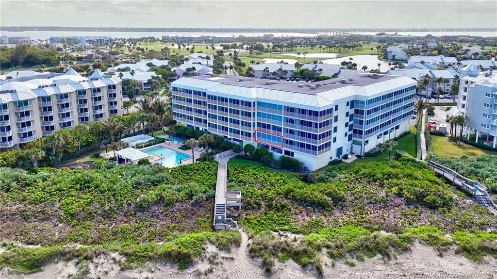 529 Northeast Plantation Road, Unit 105 Jensen Beach, FL 34957 - Photo 31 of 36 a view of a city with tall buildings