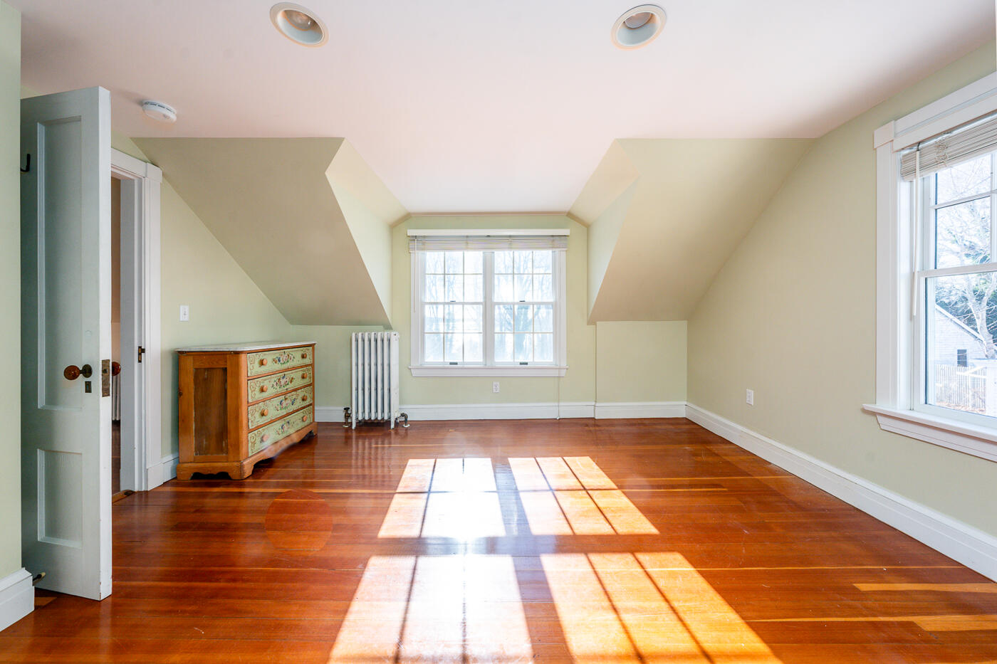 223 Main Street Wellfleet, MA 02667 - Photo 41 of 70 a view of an empty room with window and wooden floor