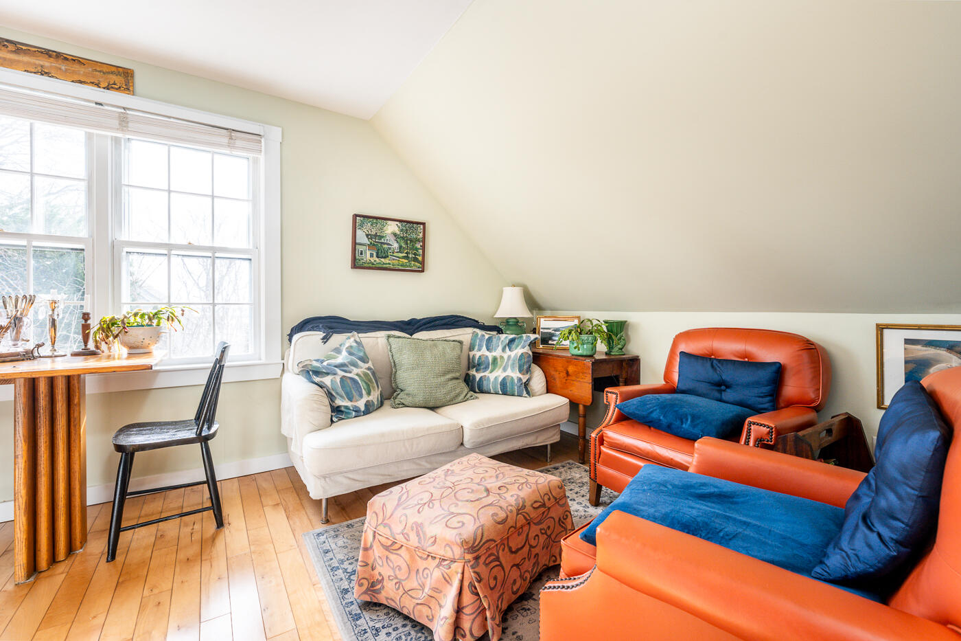 223 Main Street Wellfleet, MA 02667 - Photo 56 of 70 a living room with furniture and a window
