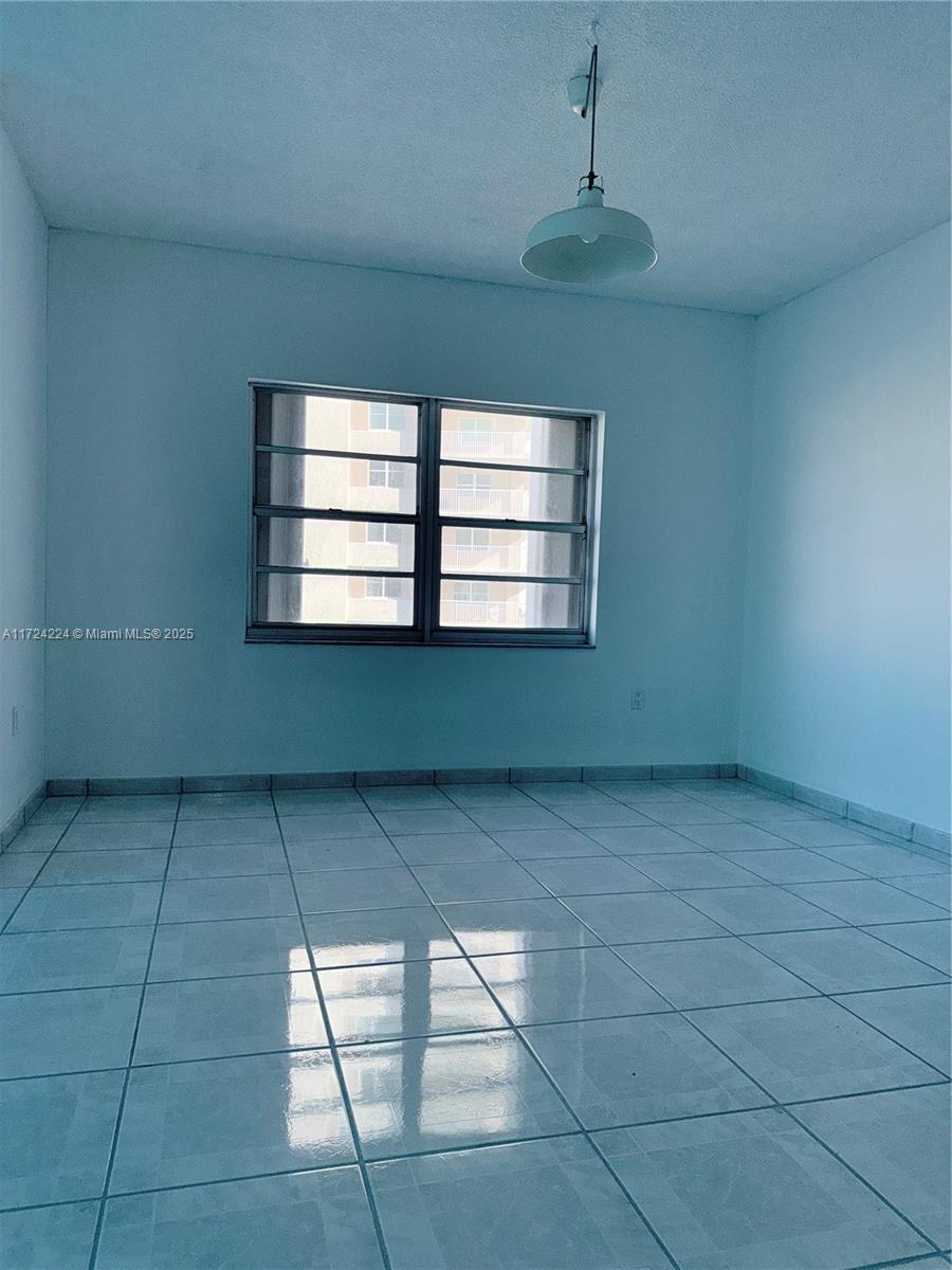 500 Bayview Drive, Unit 1031 Sunny Isles Beach, FL 33160 - Photo 17 of 40 a view of an empty room with a window