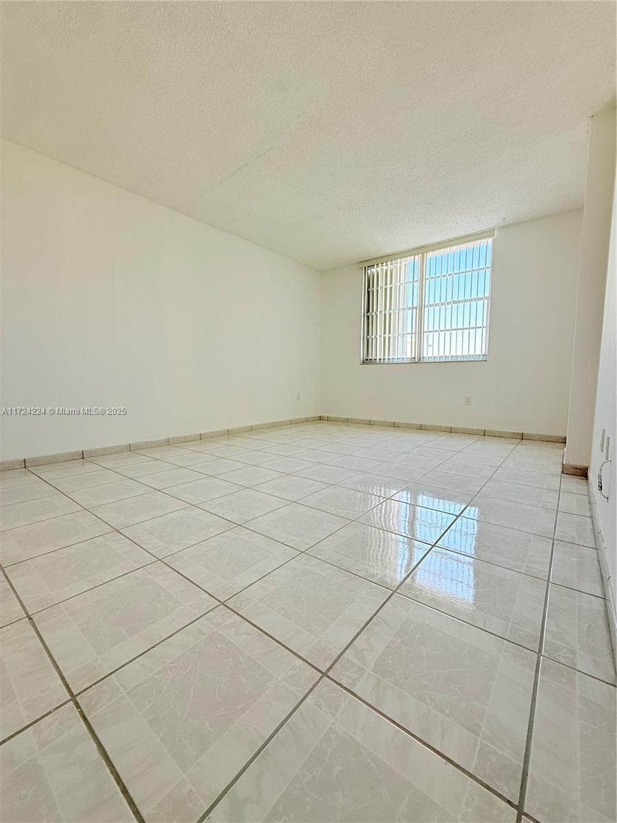 500 Bayview Drive, Unit 1031 Sunny Isles Beach, FL 33160 - Photo 26 of 40 a view of an empty room