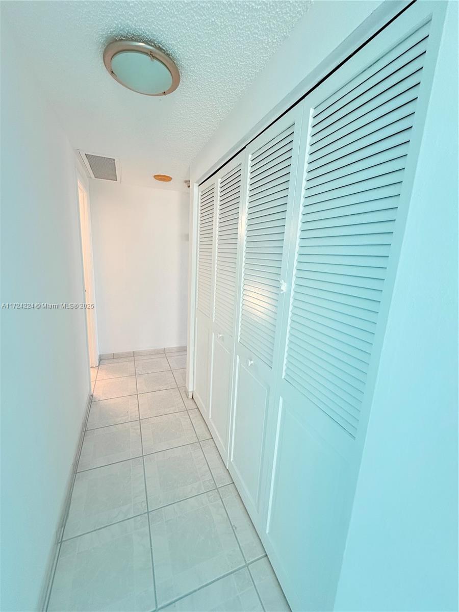 500 Bayview Drive, Unit 1031 Sunny Isles Beach, FL 33160 - Photo 32 of 40 a view of a room with a sink
