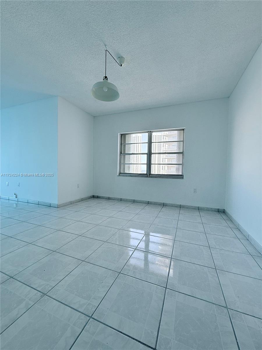 500 Bayview Drive, Unit 1031 Sunny Isles Beach, FL 33160 - Photo 35 of 40 a view of an empty room with a window