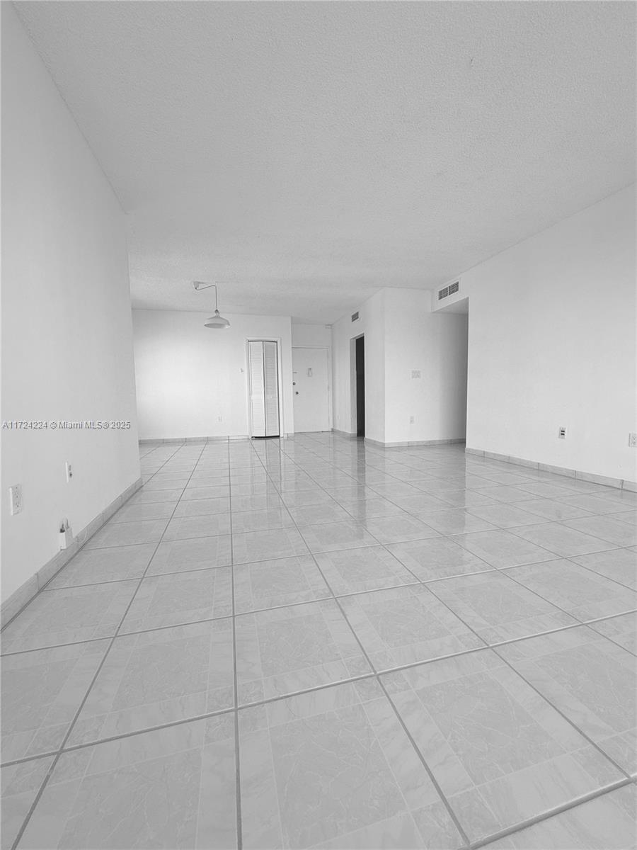500 Bayview Drive, Unit 1031 Sunny Isles Beach, FL 33160 - Photo 36 of 40 a view of an empty room with a window
