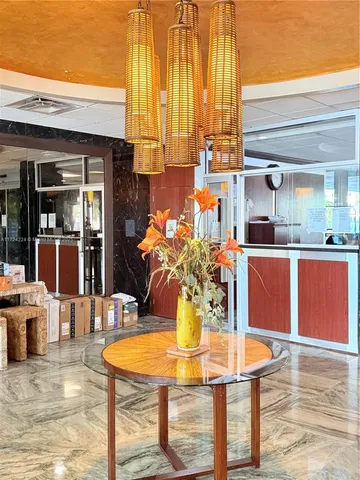 a dining table with chairs and a table