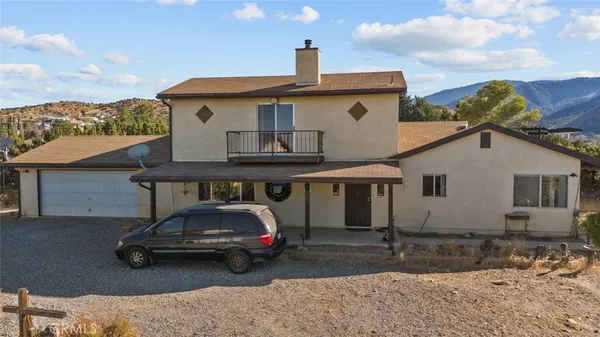 a car parked in front of a house