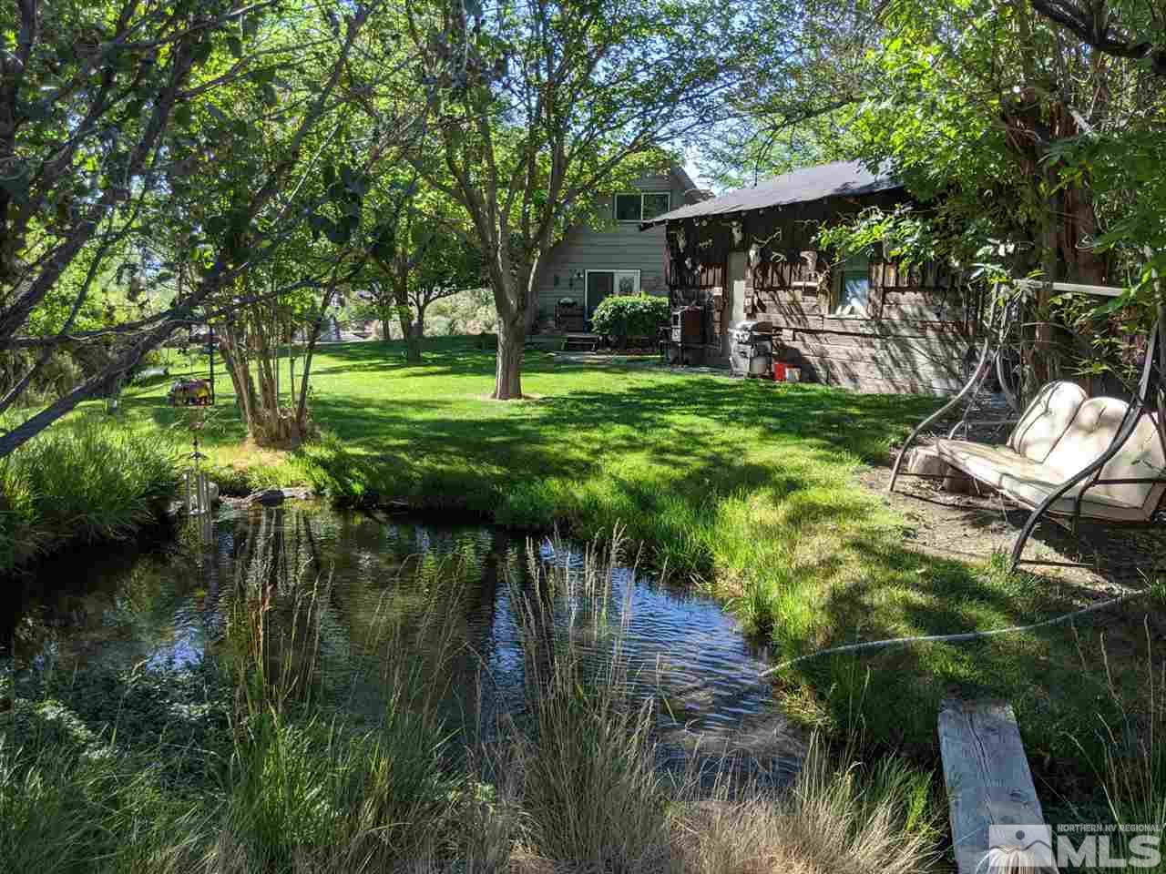 6 Smokey Court Austin, NV 89310 - Photo 10 of 20 a view of a garden with a bench