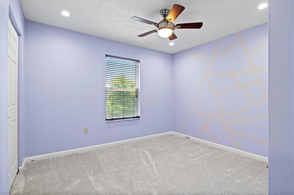 1025 Rural Ridge Drive Cheswick, PA 15024 - Photo 14 of 23 an empty room with a window and a fan