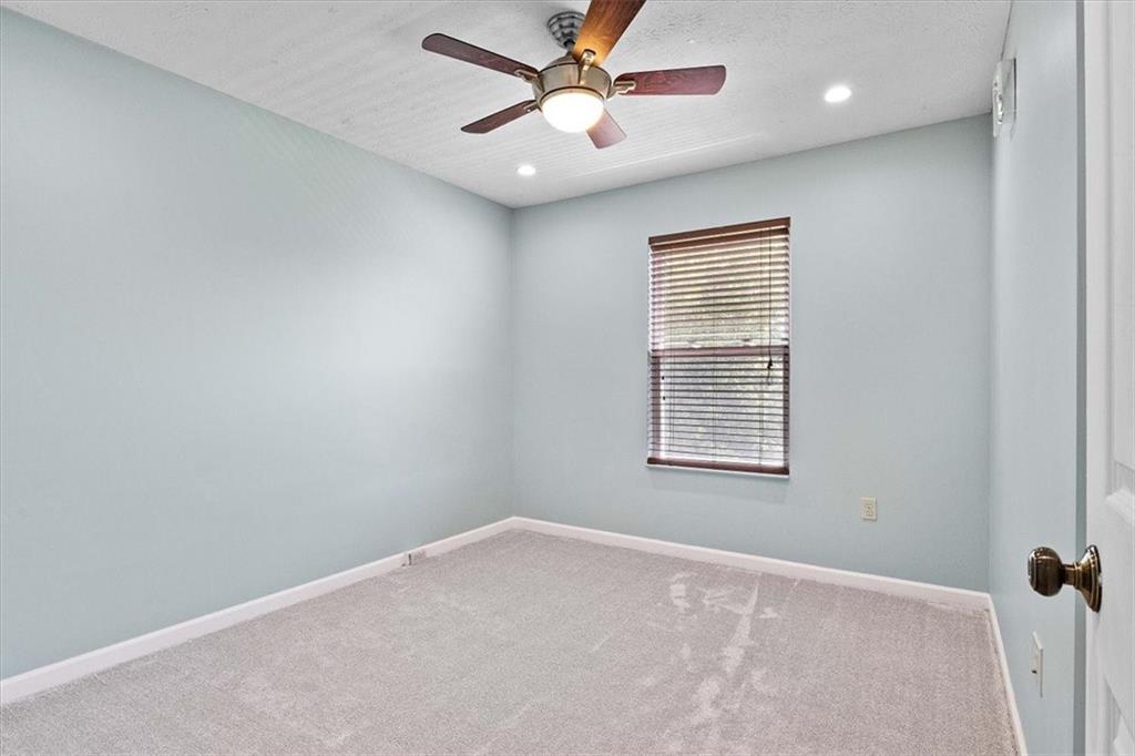 1025 Rural Ridge Drive Cheswick, PA 15024 - Photo 16 of 23 a view of a livingroom with a ceiling fan and window