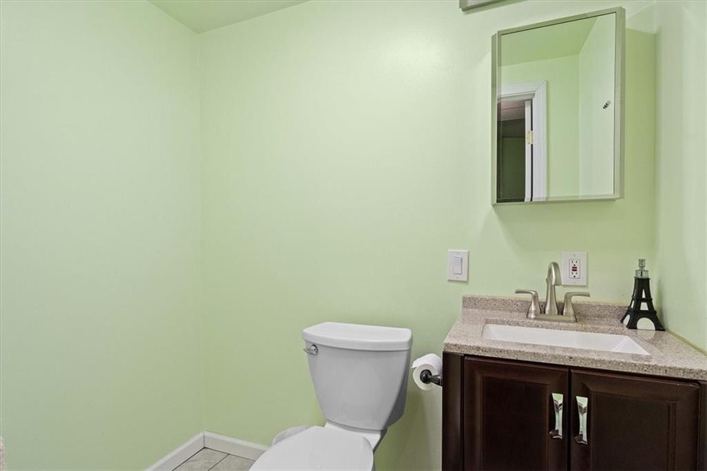 1025 Rural Ridge Drive Cheswick, PA 15024 - Photo 18 of 23 a bathroom with a granite countertop toilet and a sink