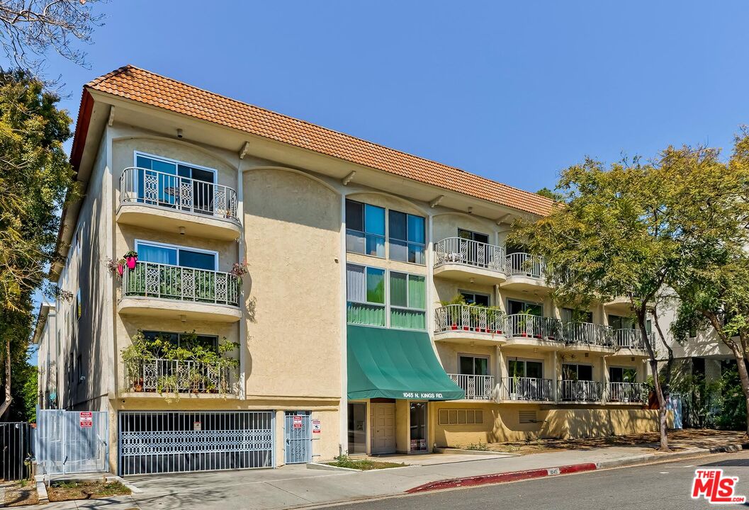 1045 North Kings Road, Unit 310 West Hollywood, CA 90069 - Photo 14 of 14 a front view of a building with street view