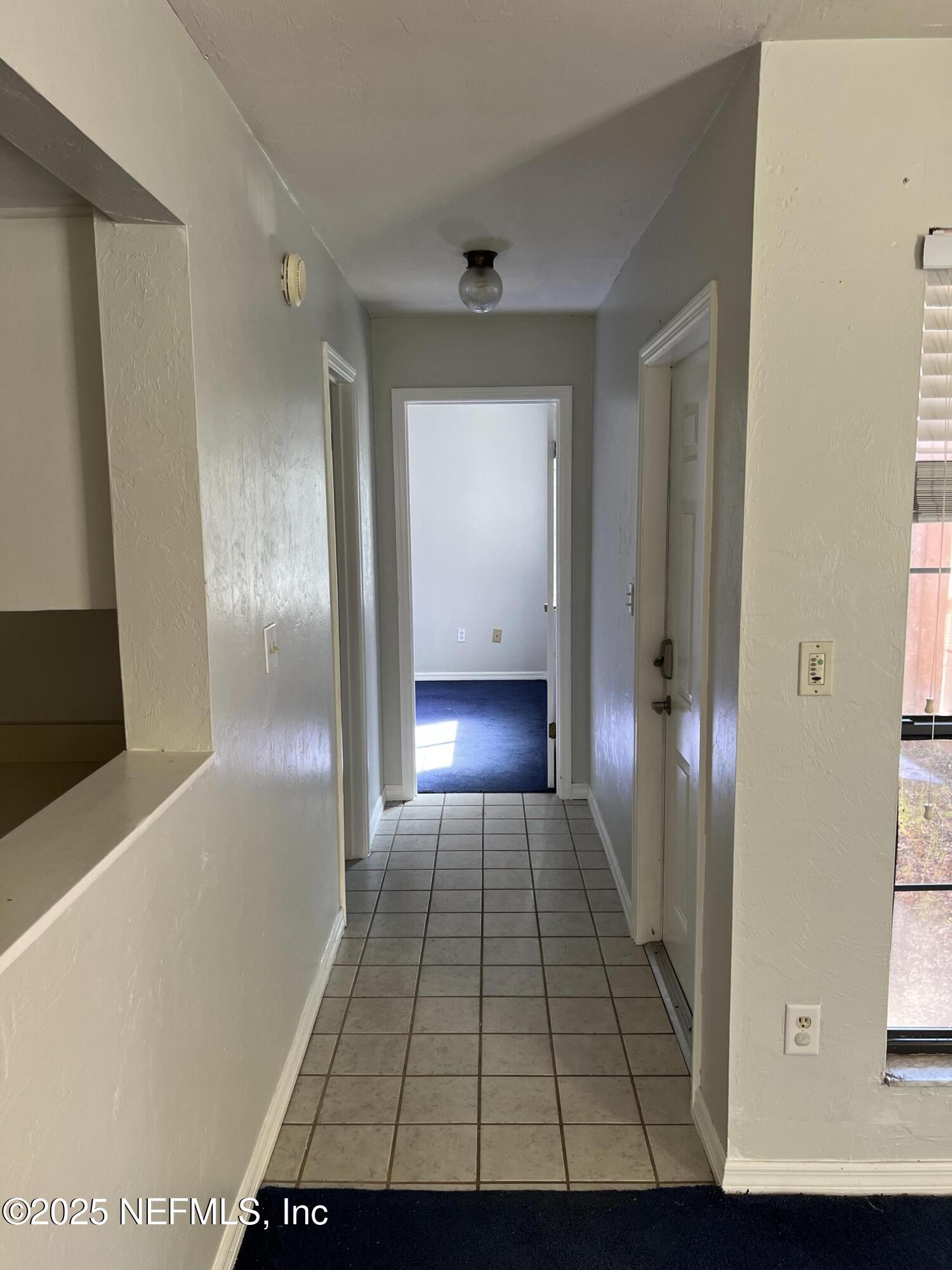 5550 Southwest 8th Place Gainesville, FL 32607 - Photo 5 of 23 a view of a hallway