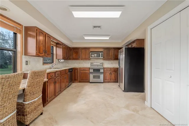 $1,150,000 | 5705 Southwest Woodham Street, Palm City, FL 34990