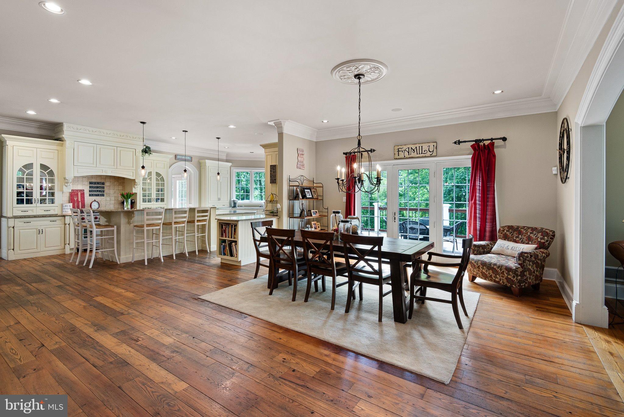 104 Timber Ridge Lane Chadds Ford, PA 19317 - Photo 14 of 65 a view of a dining room with furniture and wooden floor