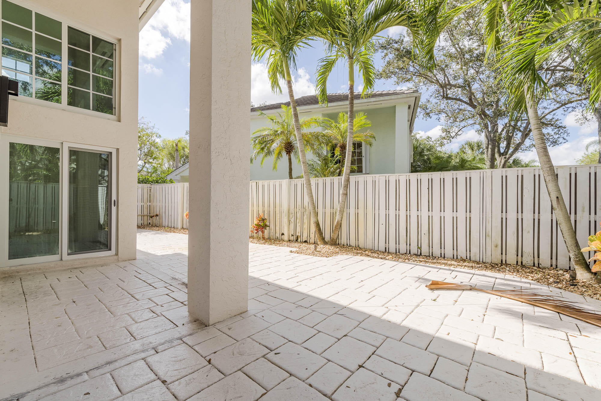 25 Commodore Place Palm Beach Gardens, FL 33418 - Photo 26 of 68 a view of a house with a backyard